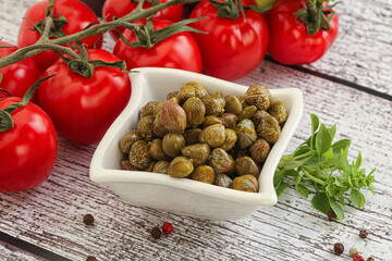 Marinated green capers in the bowl