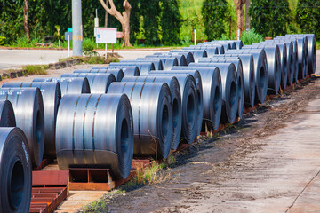 Rolls of carbon steel sheets outside the factory