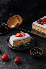 Coconut Cake slice with strawberries and blueberries