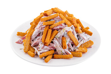 Salad with croutons and mayonnaise on plate on white background