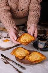 Cottage cheese pastry pies in grandmas arms