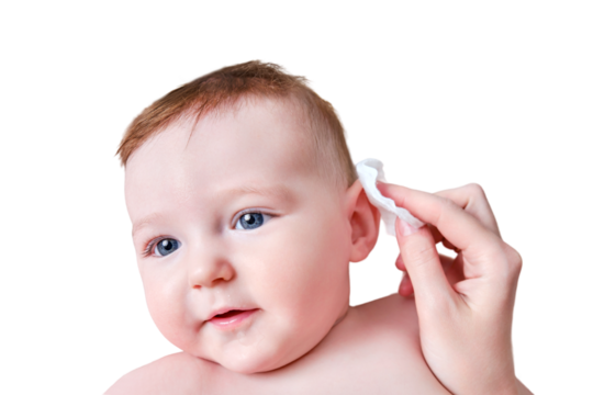 Mother hands wash the ears of a happy infant baby with a cotton pad, isolated on a white background. Mom holds hygiene face toddler kid on the sofa, six to seven months old