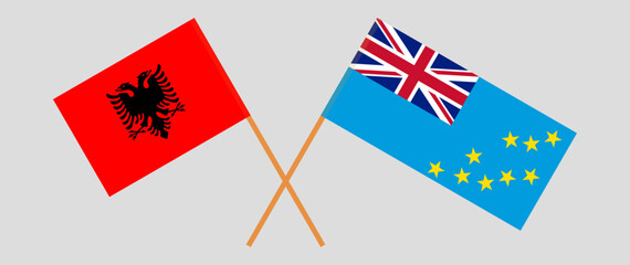 Crossed flags of Albania and Tuvalu. Official colors. Correct proportion