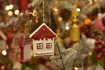 New Year. Toys on the Christmas tree in the form of houses
