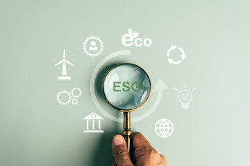 ESG Environmental, environmental, social, and governance in sustainable and ethical business on the Network connection, Magnifier focus to Earth ESG icon for develop green energy concept.