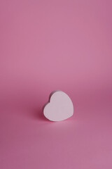 heart shape on pink background, minimalist Valentine's day concept card