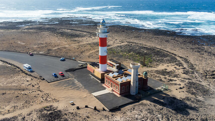 Aerial view of the lighthouse of El Toston on the north coast of Fuerteventura in the Canary...