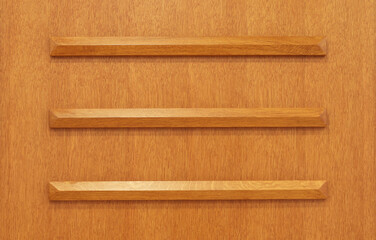 Beautiful wooden furniture detail with three horizontal beams background. Wood backdrop brown pattern ornament texture