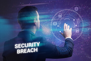 Business, Technology, Internet and network concept. Young businessman working on a virtual screen of the future and sees the inscription: Security breach