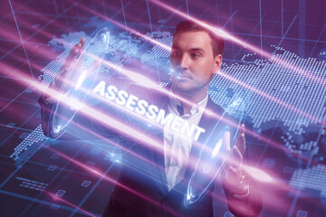 Business, Technology, Internet and network concept. Young businessman working on a virtual screen of the future and sees the inscription: Assessment