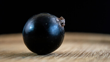 Close-up. Ripe juicy blackcurrant fruits. Summer berries