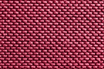Viva magenta abstract fabric texture background. Copyspace for text. Color trend year 2023.