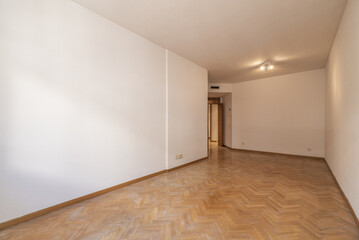 Living room in a home with French oak parquet flooring placed in a herringbone pattern