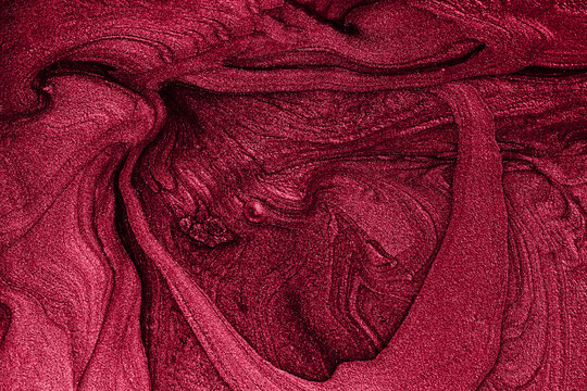 Liquid shimmer background,monochrome red color.