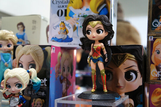 MELAKA, MALAYSIA -JUNE 24, 2021: Fiction character of bubble head Wonder Woman from DC movies and comic. Wonder Woman action figure toys in various size displayed by collector for the public.