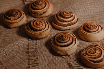 Homemade cinnabons. Baking with cinnamon. Sweets, buns. High quality photo