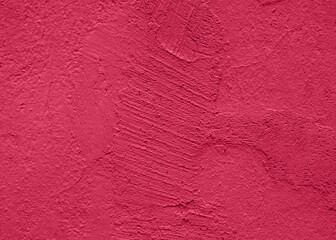Viva Magenta toned colour grunge decorative navy dark wall background. Art rough stylized texture banner trendy color 2023. Grunge Viva Magenta color texture
