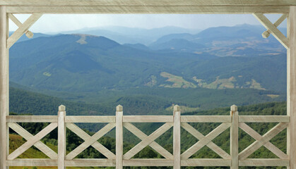 Fototapeta premium Rustic half timbered gazebo on mountain landscape