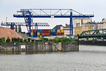 Container terminal in the Port of Ostend, Osthafen, with cranes and rubble and containers, in...