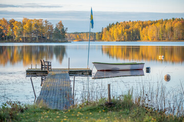 Sunny autumn morning at lake Annsjön in county Östergötland, Sweden - 550896282