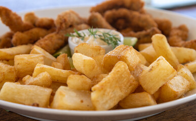 Delicious dish with fried manioc. Junk food to eat with your hand.
