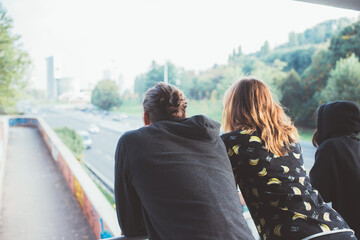 Back view three people looking city together hope in future daydreaming