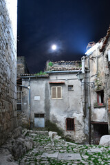 Fototapeta na wymiar A narrow street in Pietramelara, a medieval village in Caserta province, Italy.
