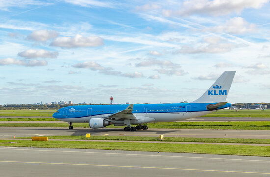 Amsterdam, Netherlands - October 19, 2022: A picture of an Airbus A330-200 KLM plane on the runway.
