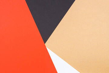 Creative abstract paper background orange, white, brown, black colors paper. Solid colors geometric...