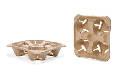 Cup holder made from recycled cardboard on a white background. The concept of using biodegradable materials for fast food delivery.