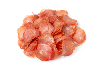 Sliced and jerky meat isolated on a white background. Pile of beef jerky pieces.