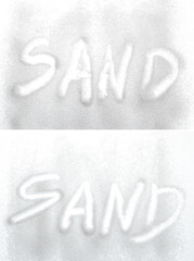 Sand, written on a sandy beach. close up