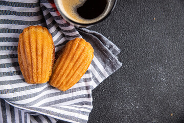 Madeleine biscuit cookies sweet dessert delicious snack healthy meal food snack on the table copy space food background rustic top view