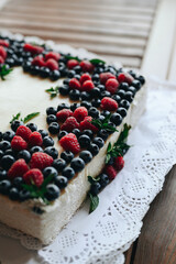 square raspberry and blueberry pie. big cheesecake birthday cake.