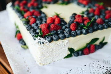 square raspberry and blueberry pie. big cheesecake birthday cake.