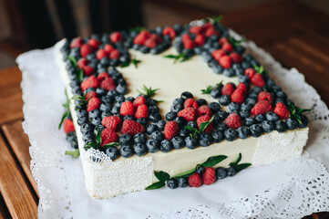 square raspberry and blueberry pie. big cheesecake birthday cake.