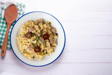 Italian risotto recipe with sausage and zucchini.