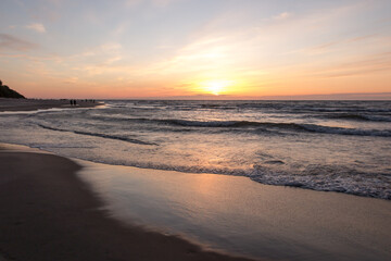 Obraz premium Spring walks along the empty Baltic Sea beach