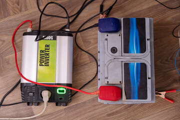 Current inverter is connected to car battery. Blekaut in Ukraine. 