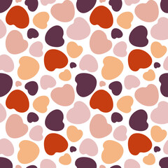 Vector seamless pattern of round hearts on a transparent background. Red, pink, purple shades, mosaic arrangement.