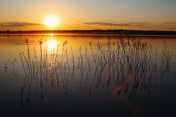 Beautiful orange sunset over river