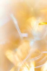 gold and blurred soft texture background for copy space. Shiny defocused wallpaper