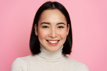 Portrait of pretty smiling happy woman looking at camera with cute positive face