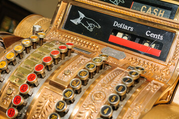 Antique cash register, buttons close up