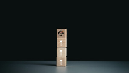 A wooden block with an arrow pointing at the top is a target.