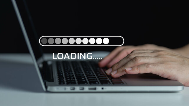 Use your computer to download the program and wait for it to load. loading bar symbol Businessman downloading digital business data form website and cloud to laptop
