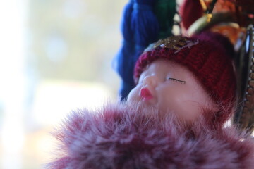 A doll with a hat