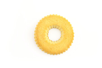 Single golden ring shape cookie isolated on white background