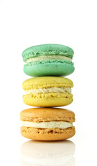 Stacked colorful macarons isolated on white background.Tasty french macaroons 