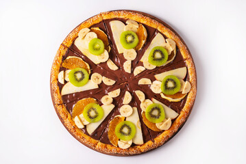 pizza with chocolate, sweet fruits, banana, kiwi, orange, pear. on a white background